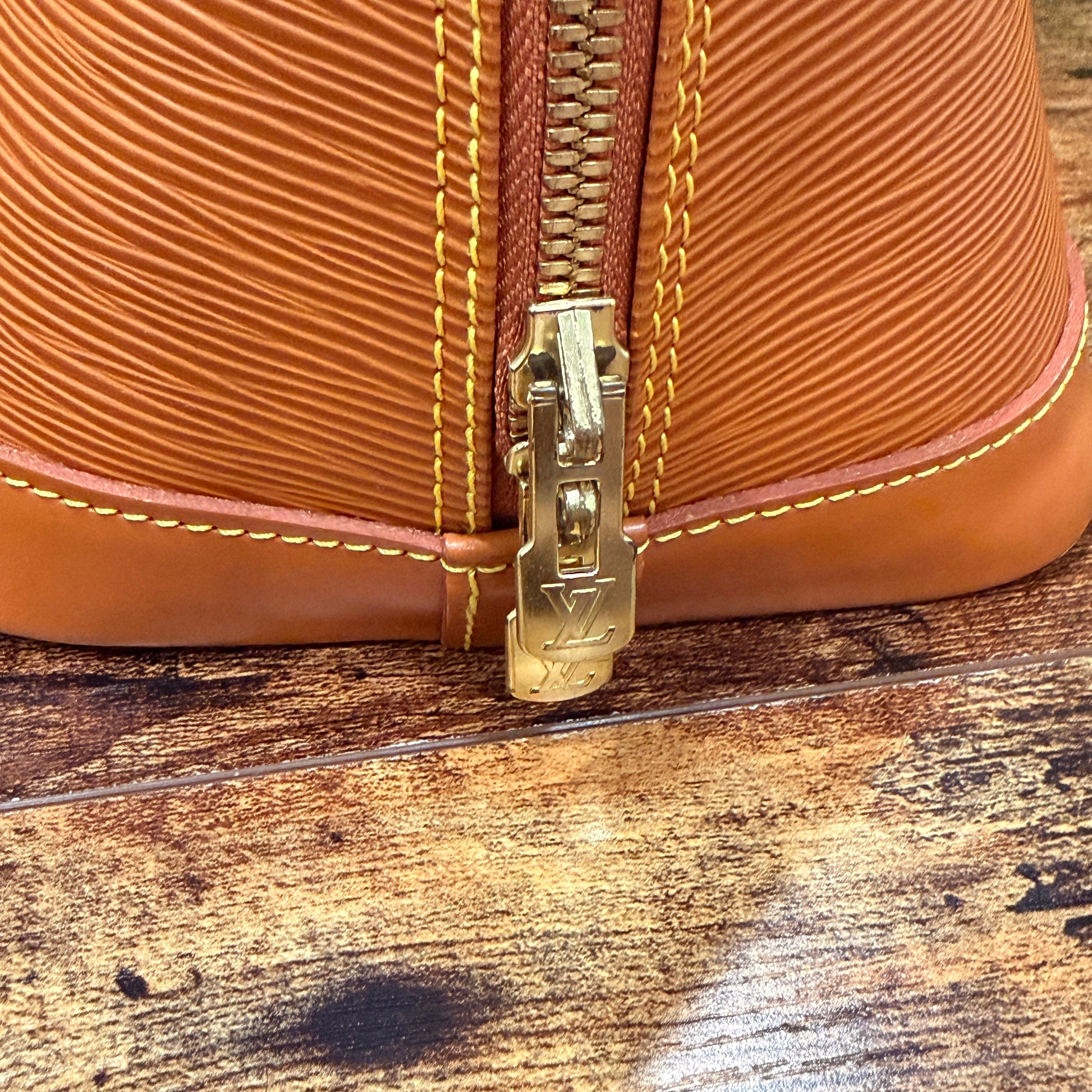 Louis Vuitton Tan Alma PM Epi