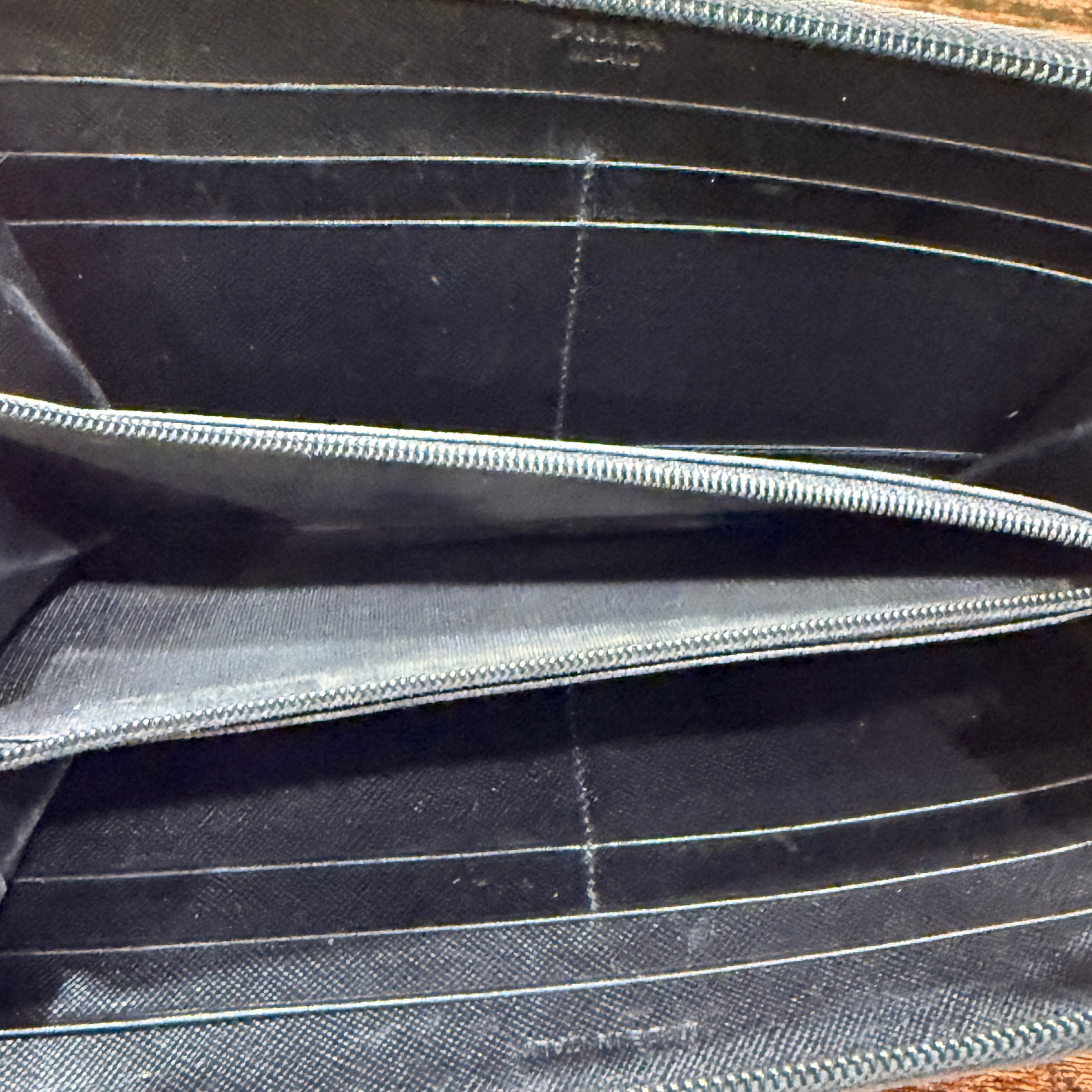 Prada Black Saffiano Zip Around Leather Wallet