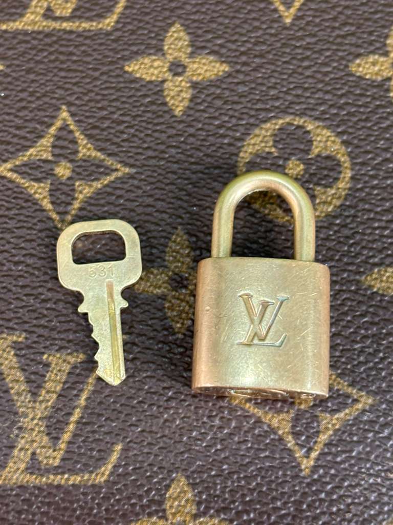 Louis Vuitton Pre-Used Padlock & Key